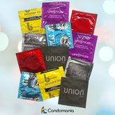 The Snugger Fitting Condom Sampler by Condomania is displayed in a flat lay pattern against a blurred background, showcasing colorful wrappers in red, yellow, blue, black, and purple. The assorted condoms include various snug-fitting options from brands such as Lifestyles, UNION, Atlas, and Snugger fit.